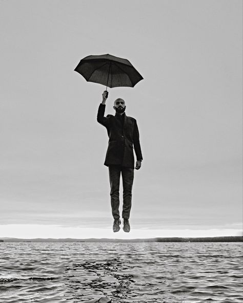 #fly #man #gentleman #umbrella #water #bnw #monochrome Man With Umbrella, Leaf Umbrella, Bulb Ideas, Distortion Photography, Men Posing, Umbrella Tattoo, Man On Fire, Lake Dock, Umbrella Man