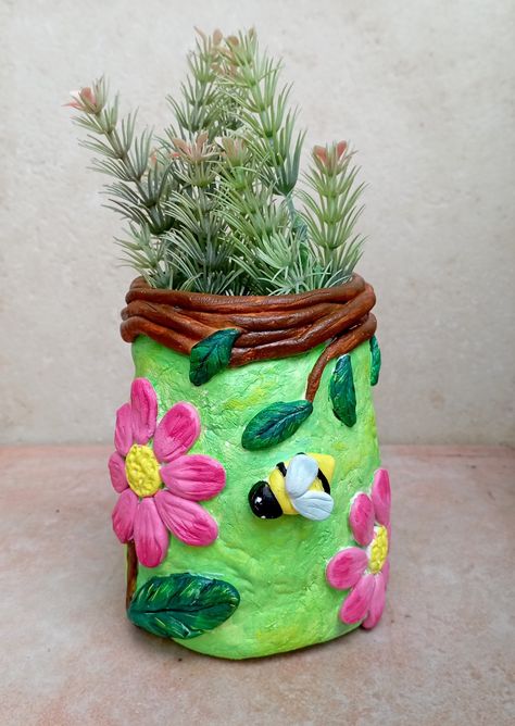 diy planters using wall putty | wall putty crafts Pot Decoration With Clay, Wall Putty Crafts Diy, Craft Out Of Waste, Diy Crafts Pencil Case, Pen Holder Diy, Bottle Paint, Creative Planter, Diy Planter, Cardboard Crafts Diy