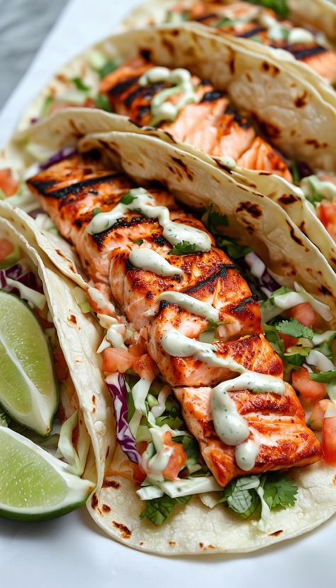 Delicious Salmon Tacos Recipe Trout Tacos Recipes, Meals With Salmon Healthy, Salmon Taco Marinade, Salmon And Sausage Recipes, Salmon Street Tacos, Salmon Recipes Tacos, Blackened Salmon Tacos Recipe, Salmon Meals Healthy, Breakfast Ideas With Salmon