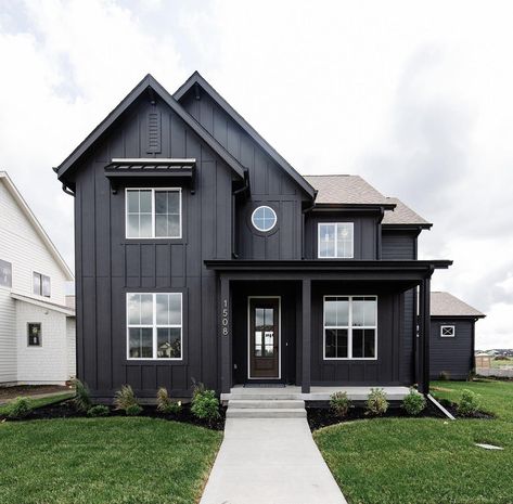 Exterior Paint Dark Trim, Dark Grey Metal House, Dark Gray Siding Exterior Black Trim, Grey Siding Black Trim, Dark Siding White Windows, Charcoal Grey House Exterior, Siding Colors For Houses Vinyl, Black Craftsman House, Dark Grey House Exterior