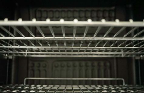 9 Quick and Easy Ways to Clean Oven Racks - Today's Homeowner Clean Oven Racks, Pier And Beam Foundation, House Plumbing, Cleaning Oven Racks, How To Install Gutters, Painted Patio, Stainless Steel Oven, Gas Oven, Cleaning Gutters