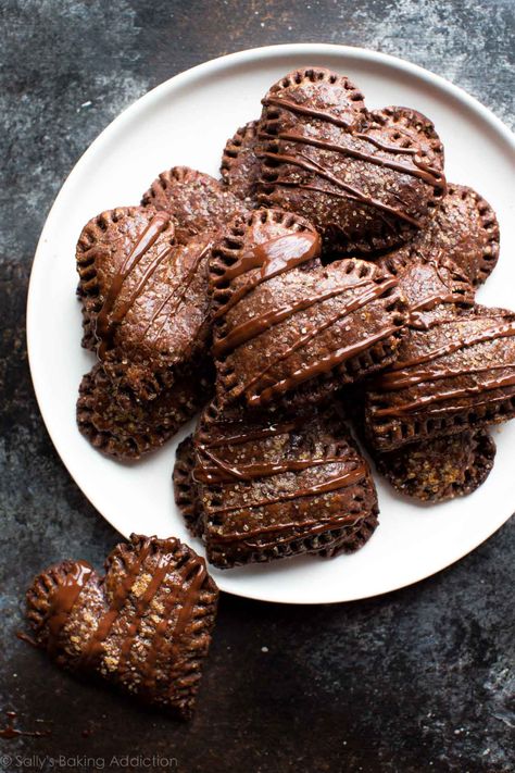 How to make delicious, warm, and gooey chocolate hand pies with chocolate pie dough and chocolate ganache filling! Recipe on sallysbakingaddiction.com Chocolate Hand Pies, Chocolate Pop Tarts, Heart Healthy Desserts, Recipe Photo, Chocolate Ganache Filling, Hand Pie Recipes, Warm Desserts, Sally's Baking, Chocolate Lava Cake