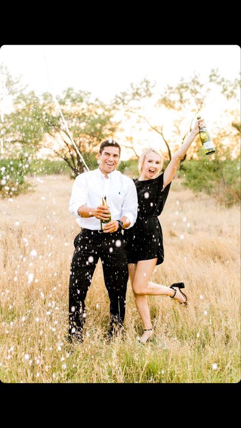 Champagne Couple Photoshoot, Engagement Champagne Photos, 1st Anniversary Photo Shoot Ideas, Save The Date Photoshoot Ideas, Couples Champagne Photo Ideas, Champagne Engagement Photos, Engagement Photoshoot Ideas With Champagne, Champagne Popping Pictures, Save The Date Outfit Ideas