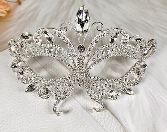 #GlamUp #EtsySale #MasqueradeElegance #JewelryLove 
#StyleUnmasked #EtsyFinds #MasqueradeBall #ElegantEarrings #RoyalTiaras #ShopNow #EtsyShop #MasqueradeBall #MardiGras #VenetianMas #EtsySellers #BridalTiara #PromQueen #PrincessTiara #Handmade #BridalJewelry #BirthstoneJewelry #StatementEarrings Butterfly Masquerade Mask, Butterfly Masquerade, Costume Masquerade, Masquerade Wedding, Carnival Themed Party, Happy Jewelry, Royal Crowns, Dazzling Earrings, Royal Tiaras