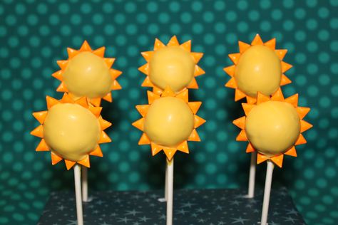 Sun cake pops - To go with solar system cake, I made sun cake pops.  Dipped in yellow colored white chocolate and decorated with Wilton orange triangles. Sun Cake Pops, Sunshine Birthday Party Ideas, Solar System Cake, Sunshine Birthday Party, Sun Cake, Planet Cake, Sunshine Birthday Parties, Sunshine Cake, Pop Cupcakes