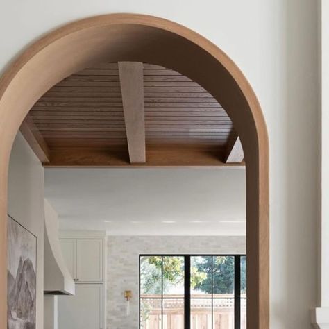 Nicole Salceda on Instagram: "Left or right? Both beautiful views! Arches aren’t going anywhere and then you add the white oak detail and it takes something good to something special!   Build: @branaghcustomhomes  Lead Designer:  @sarahclarkdiaz  📷 @jessicabrydsonphotography" Arch Pantry Entry, Archway In House, Arched Cased Opening, White Oak Trim, Curved Archway, Wood Archway, Wooden Archway, Arch Opening, Arch Kitchen