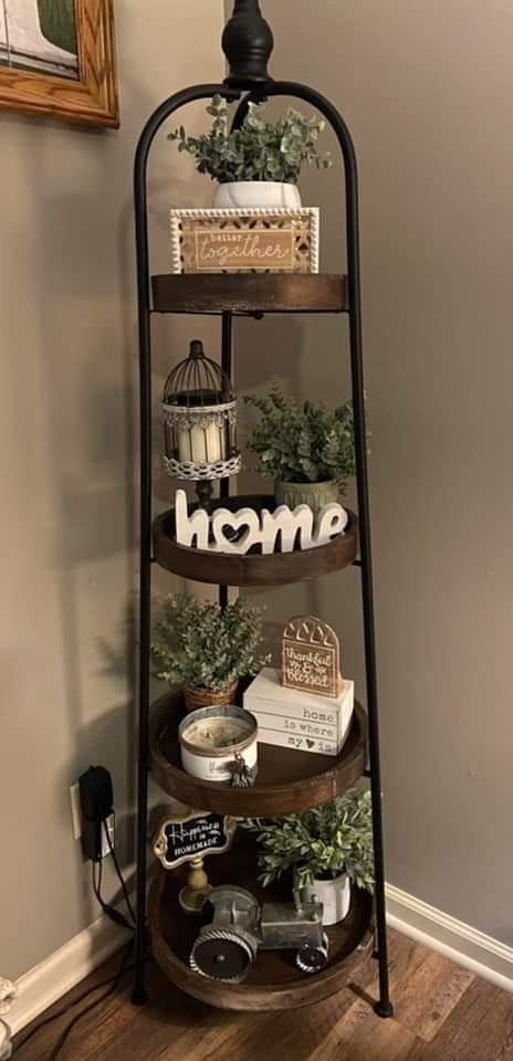 Small Living Room Ideas Farmhouse Boho, Farmhouse Decor For Small House, Corner Floor Decor, Tier Shelf Decor Living Rooms, 4 Tier Stand Decor, Small Entertainment Center Decor, Dining Room Shelf Decor Farmhouse, Blue Jars Decor, Four Tier Shelf Decor