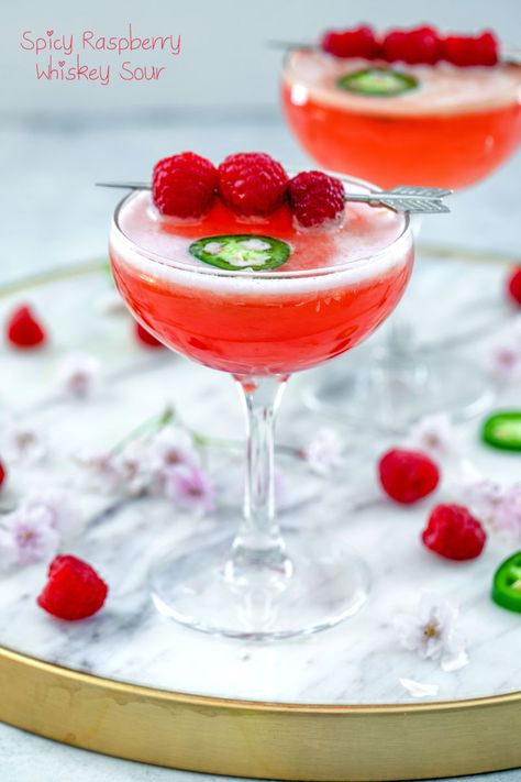 Spicy Raspberry Whiskey Sour Recipe | We are not Martha Raspberry Whiskey Drinks, Raspberry Sour Cocktail, Raspberry Cocktail Recipes, Flower Drinks, Good Whiskey Drinks, Rye Whiskey Cocktail, Homemade Whiskey, Whiskey Sour Cocktail, Healthy Cocktail Recipes