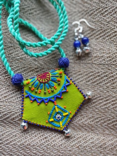 #craftsbite Handmade Fabric Jewellery, Hand Embroidered Jewelry, Diy Fabric Jewellery, Cotton Jewelry, Art Jewelry Design, Handmade Clay Jewelry, Traditional Embroidery, Diy Jewelry Unique, Handmade Embroidery Designs