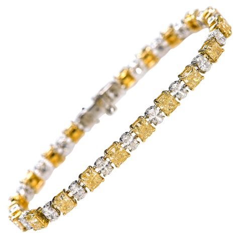 Yellow Canary, Cushion Cut Solitaire, Canary Diamond, Bracelet Tennis, Gold Eagle, Diamond Tennis Bracelet, Tennis Bracelet Diamond, Yellow Diamond, Oval Diamond