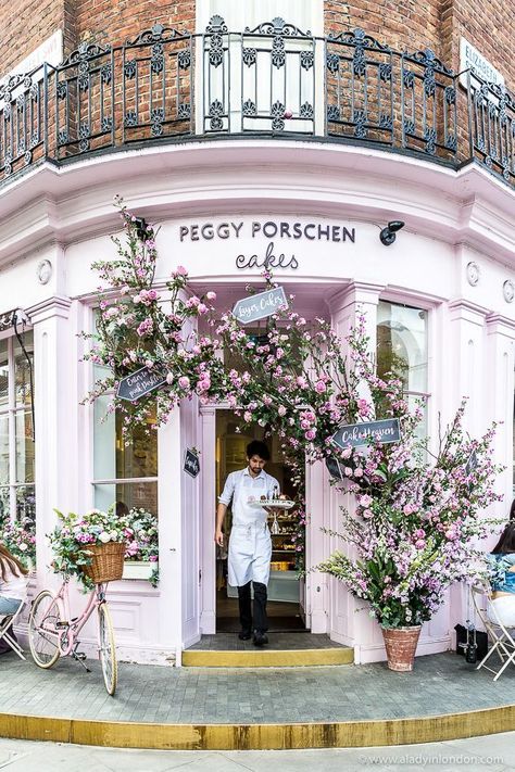 Peggy Porschen cafe and cake shop is one of the prettiest cafes in London. The flower covered facade is beautiful. #shop #cafe #london #pink #flowers Peggy Porschen Cakes, Peggy Porschen, London Places, Shop Fronts, Pastry Shop, London Eye, London Travel, Cafe Design, Coffee Shops