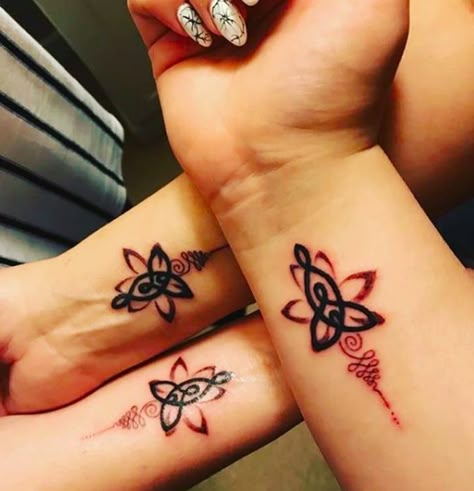 CafeMom.com : Signs & Symbols : 50 Mother-Daughter Tattoos That Celebrate an Unbreakable Bond -- Nothing bonds a mother to her daughters quite like a meaningful tattoo, especially one that looks culturally and spiritually significant. More from CafeMom: 50 Gorgeous Finger Tattoos That Deserve a Thumbs Up Mother Daughter Infinity Tattoos, Mother Tattoos For Children, Henne Tattoo, Mother Son Tattoos, Mom Daughter Tattoos, Tiny Heart Tattoos, Inspiration Tattoos, Sweet Tattoos, Mother Tattoos