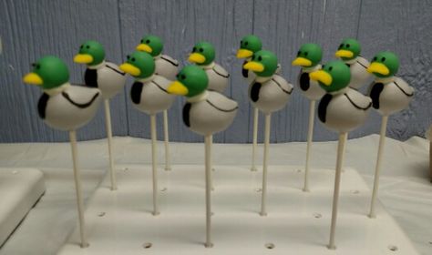 Mallard duck cake pops Hunting Cake Pops, Mallard Duck Party Ideas, Mallard Duck Smash Cake, One Lucky Duck Birthday Party Mallard, Mallard Cake, Mallard Duck Birthday Party, Mallard Duck Cake, Duck Cake Pops, Mallard Duck Baby Shower Ideas