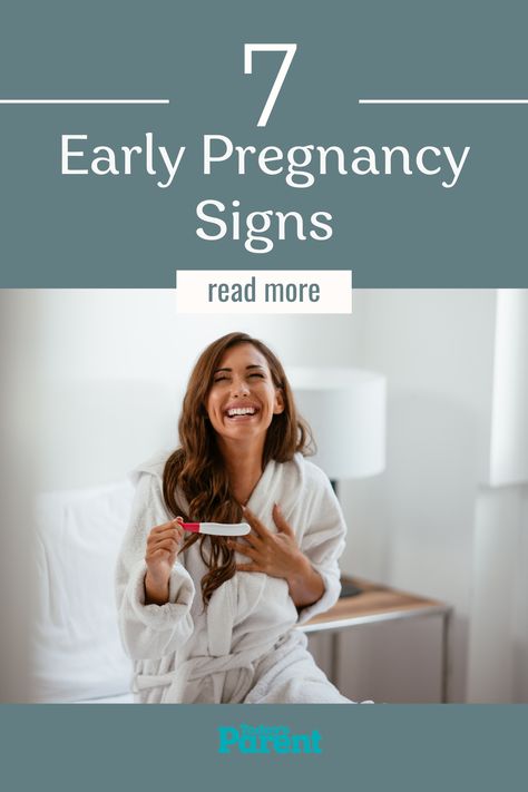 Woman in white robe holding a pregnancy test and smiling while clutcing her heart Sign Of Pregnancy, 4 Weeks Pregnant, First Week Of Pregnancy, Concert Signs, Home Pregnancy Test, Early Pregnancy Signs, Early Pregnancy, All About Pregnancy, Face Care Routine