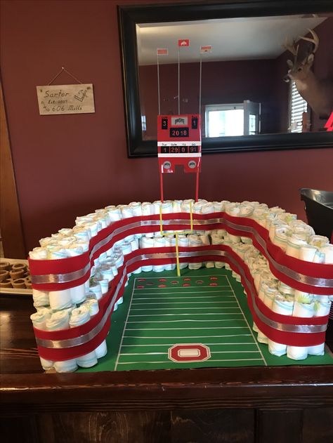 OSU Horseshoe stadium made of diapers Ohio State Baby, Buckeye Baby, Diaper Party, Football Baby Shower, Football Baby, Ohio State Football, Diaper Cakes, Reveal Ideas, Baby Sprinkle