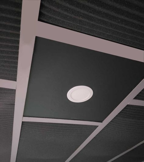 Easy way to makeover an existing drop ceiling. Customize by widening the grid and using acoustic foam for tiles. Update lighting with LED recessed lights. Drop Ceiling Tiles Diy, Diy Drop Ceiling, Black Drop Ceiling, Ceiling Tiles Diy, Drop Ceiling Makeover, Black Ceiling Tiles, Drop Ceiling Basement, Drop Ceiling Panels, Ceiling Makeover