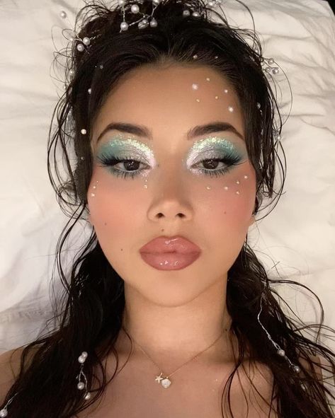 Nazlia | don’t bring me to tears when I just did my makeup so nice.. 🧜🏼‍♀️💧 | Instagram Winter Rave Makeup, Fun Winter Makeup, Hot Glue Tears Makeup, Ocean Inspired Makeup Looks, Cruise Makeup Ideas, Statue Of Liberty Makeup, Light Under Eye Makeup, Undereye Circles Makeup, Ocean Themed Makeup