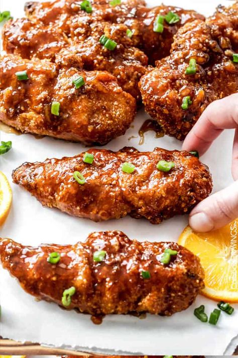 Sweet and Spicy Baked Orange Chicken Tenders - Carlsbad Cravings Chicken Tender Recipes Baked, Spicy Chicken Tenders, Chicken Orange, Baked Orange Chicken, Tailgate Parties, Orange Baking, Recipe Using Chicken, Chicken Tenderloin Recipes, Baked Chicken Tenders