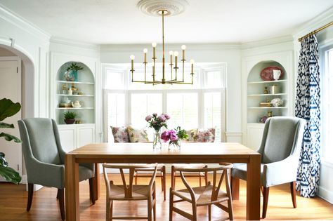 A few simple changes can completely transform a space. Things like fresh paint and moulding plus the addition of a few wow moments can make all the difference. See how Diane + Emily of Rehabitat started with this dining room and made it into a space that truly shines. And one that boasts a mighty fine chandelier might […] Corner Cabinets Dining Room, Built In Corner Cabinet, Corner Cabinet Dining Room, Dining Room Trends, Dining Room Built In, Dining Room Corner, Diy Dining Room Table, Cabinet Dining Room, Transitional Dining Room