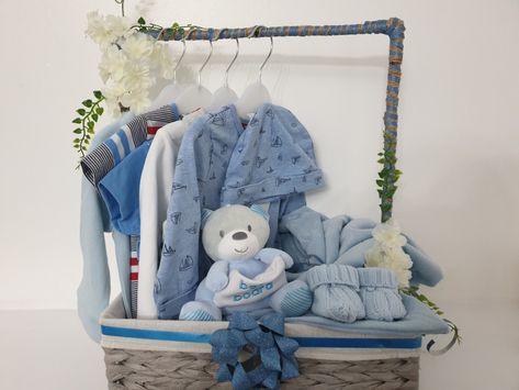 Beautiful gift for new born baby easy diy at home 😍💙 Easy Diy At Home, Baby Shower Hamper, Baby Boy Gift Baskets, Baby Gift Wrapping, Baby Shower Gift Box, Baby Shower Baskets, Baby Shower Gift Basket, Baby Gift Hampers