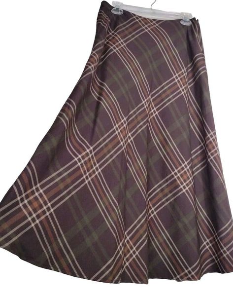 This brown skirt in size 10 has a long length, making it ideal for winter, fall, and spring seasons. The skirt's accents include a zipper, and it is suitable for women of all ages and sizes. It is perfect for those who love retro, preppy, university, 90s, and holiday themes. This skirt is not only stylish but also durable as it is made in Vietnam. Warm Academia, Chambray Fabric, Chambray, Work Wear, Midi Skirt, Siding, Womens Skirt, High Rise, Size 10