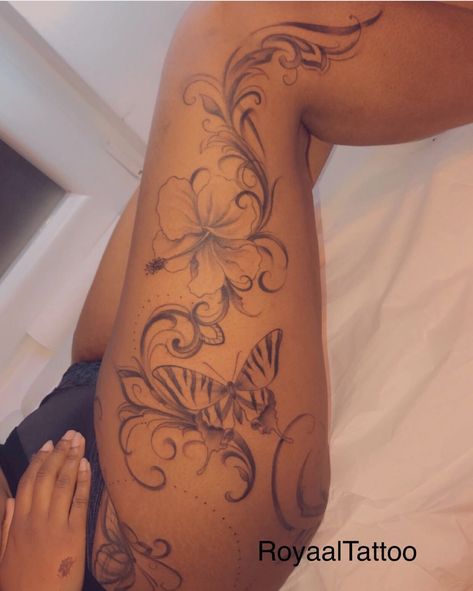 Black Fairy Tattoos For Women, Black Women Stomach Tattoos Ideas, Lily Flower Tattoos Black Women, Leg And Thigh Tattoos, Unique Thigh Tattoos Women, Fairy Tattoo On Black Women, Side Leg Tattoos Women Thighs, Baddie Thigh Tattoos, Colored Tattoos On Brown Skin