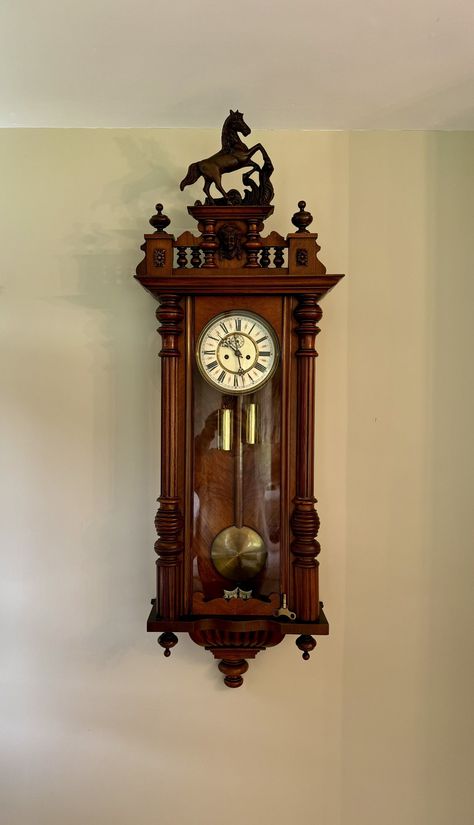 Stunning quality antique Victorian carved walnut Vienna wall clock having a quality carved walnut case with reeded turned columns, having all the original finales, fantastic shaped top finished with a carved horse finale to the top and a shaped bottom, having a single walnut glass door opening to reveal a circular dial with Roman numerals surrounded by red detail, with the original hands, having an eight day movement striking on the hour and half hour on a gong, original two brass weights and br Gothic Clock, Old Fashioned Clock, Brass Pendulum, Antique Wall Clocks, Gear Clock, Vintage Clocks, Table Clocks, Door Opening, Old Clocks