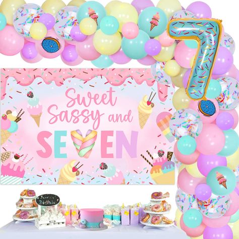 PRICES MAY VARY. Sweet sassy and seven: Our Sweet 7th Birthday decorations will create a magical and memorable birthday party for your little girl. The vibrant colors and sweet designs will make her feel like a princess on her special day. Donut ice-cream theme: The theme of our party decorations is centered around delicious donuts. The sweet sassy and seven backdrop features a colorful donut design with the words "Sweet, Sassy, and Seven" in bold letters. The donut balloons are also a great add Donut Bday Party Ideas, 7th Birthday Girl Themes, Birthday Party Themes For Girls Age 7, Birthday Party Ideas For 7 Year Girl, Seven Birthday Theme, Sweet Treat Birthday Party Theme, Sweet And Sassy Birthday Party, Seven Year Old Birthday Party Ideas, Girl 7th Birthday Party Ideas