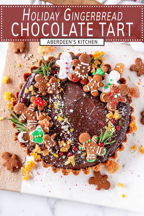 Looking for a dessert that says "wow" at your holiday party? Say hello to the gingerbread chocolate tart! This sweet treat is a match made in heaven, with a spicy gingersnap crust and a decadent, silky chocolate ganache filling. And the best part? It's a cinch to whip up! From aberdeenskitchen.com #gingerbread #chocolate #tart #festive #holiday #dessert #recipe #pie #christmas #baking Gingerbread Chocolate Tart, Gingerbread Tart, Holiday Tarts, Gingerbread Crust, Spicy Gingerbread, Gingerbread Chocolate, Pie Christmas, Gingerbread Cake Recipe, Ganache Filling