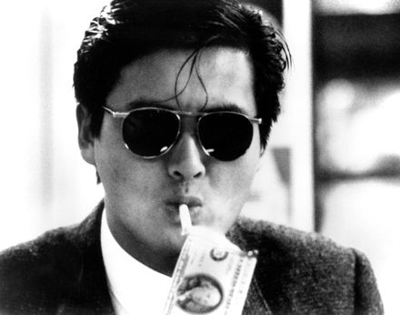 This is Chow Yun Fat in John Woo's classic crime movie A Better Tomorrow.  The most iconic thing in the movie was the Alain Delon 707A sunglasses which sold out as a result and which are now impossible to find. John Woo, Hong Kong Cinema, Hong Kong Movie, Famous Pictures, A Better Tomorrow, Better Tomorrow, Alain Delon, Tough Guy, B Movie