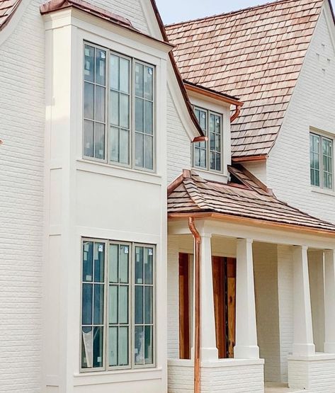 Purple Cherry Architects on Instagram: “Unique living finishes such as copper gutters and downspouts and a cedar shake roof combine to create an elegant elevation on our in-…” Copper Gutters And Downspouts, Cedar Shake House, Copper Roof House, W Design Collective, Exterior Columns, Gutters And Downspouts, Cottagecore House, Cedar Shake Roof, Cedar Shingle Roof