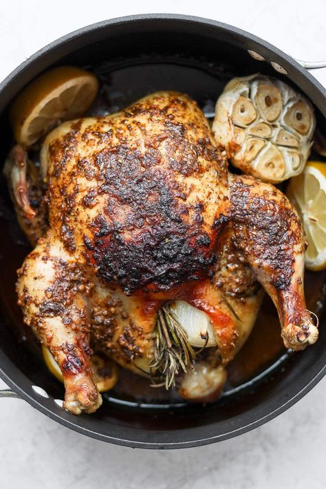 Learn how to roast a whole chicken plus get tips and tricks for flavoring and cooking the most tender whole chicken. Best Roast Chicken Recipe, Roast A Whole Chicken, Whole Roast Chicken Recipe, Roasted Chicken Recipe, Easy Chicken Marinade, Fit Foodie Finds, Chicken Marinade Recipes, Whole Chicken Recipes, Top Chicken Recipes