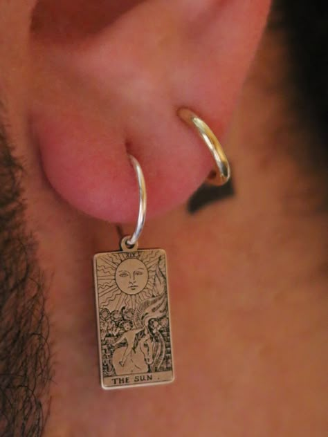 "Copy and paste into your browser, get 15% off ➔ https://bit.ly/VD15OFF Offering all 22 tarot cards from The Major Arcana, the choice is yours with this tarot card earring. DETAILS: -One or Two Hoop Earring(s) (Based on the option you choose) -18mm x 10mm Sterling Silver Charm -12mm Sterling Silver Hoop Earring -Sleeper Closure You will receive one (or 2) tarot card earring(s), in the design of your choice. **Every item is handmade, this means that each will be unique and may not look EXACTLY like the picture, but it will look very similar ➡ORDER PROBLEMS If there are any problems with your order please contact me, my goal is for you to be happy with your products and I will do what I can to help! ➡BULK ORDERS I gladly make bulk orders! For every bulk order of 15+, there is a special disco Tarot Symbolism, Card Earring, Mystic Jewelry, Spiritual Style, Card Earrings, Silver Hoop Earring, The Major Arcana, Mystical Jewelry, Witchy Stuff