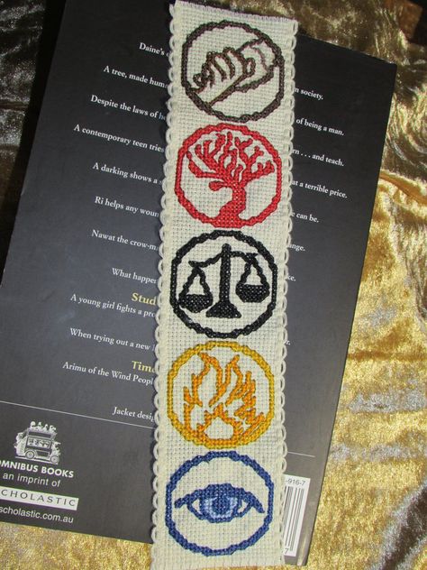 So... I've finally caved and done a cross-stitch bookmark with the factions from Divergent. Even though I haven't read it yet (Sorry! I'll get around to it eventually!) But yeah, it was fun stitchi... Divergent Bookmarks, Irish Pattern, Geeky Cross Stitch, Pixel Beads, Creative Bookmarks, Plastic Canvas Stitches, Cross Stitch Books, Upcycle Sewing, Cross Stitch Bookmarks