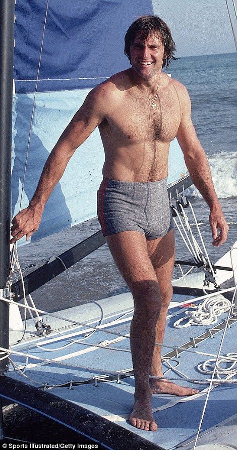 Transition underway: The gold medalist revealed a suspiciously smooth chest, legs, and arms during a trip to Greece with his family in 2013, a marked change from the hairy, muscular man pictured during a Sports Illustrated shoot in 1980 (pictured) Vintage Hollywood Men, Young Jfk, Vintage Guys, Vintage Muscle Men, Hasan Piker, Shirtless Actors, Ideal Male Body, Trip To Greece, Robert Conrad