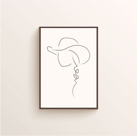 Here is the first poster that I present to you. It is called “Braided Cowgirl” on the website!  When we are young in horse events, this style is pretty much everyday style. I mean the cowboy hat and the braid on the side. And then, we grow up and realize that we CANNOT drive with that 🤣   Available on www.wallwest.ca Line Art Cowgirl, Cowgirl Outline Tattoo, Cowboy Hat Line Drawing, How To Draw A Cowboy Hat Easy, Cowgirl Line Drawing, Cowgirl Outline Drawing, Cowgirl Drawing Simple, Cowboy Hat Line Art, Western Line Drawing