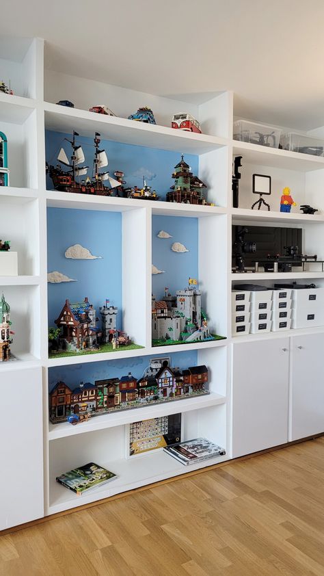 Lego Modular Buildings Display, Brickheadz Display, Lego Display Ideas Shelves, Lego Wall Storage, Lego Set Display Ideas, Lego Shelf Display, Lego Cabinet, Marvel Boys Bedroom, Lego Display Shelves