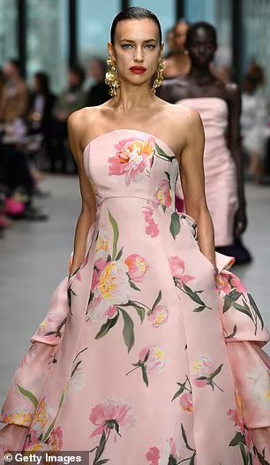 Irina Shayk dazzles in a pink floral ballgown as she walks the runway for Carolina Herrera at NYFW | Daily Mail Online Floral Runway, Floral Ballgown, Pink Gown, Pink Gowns, Irina Shayk, Pink Floral Dress, Floral Style, Carolina Herrera, New York Fashion Week