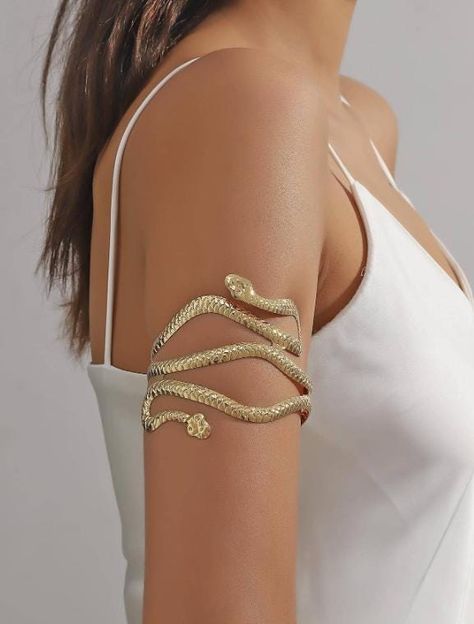 📍PRODUCT SIZE Diameter: 8.4 cm Diameter: 3.3 inch 📍PRODUCT FEATURES Color: Yellow Gold Material:Zinc Alloy Type: Snake Design Arm Cuff Style: Fashionable ✈ PROCESSING TIMES All orders are shipped within 1-2 business days after order is received. 📍TRANSPORT İncludes tracking number 📞COMMUNICATION We recommend that you add your phone number in order not to encounter any problems during the delivery of the cargo. 💫 Thank you for choosing our store. Snake Inspired Fashion, Silver Arm Band, Upper Arm Cuff Bracelet, Gold Arm Cuff, Upper Arm Cuff, Arm Bangles, Gold Arm Band, Arm Cuff Bracelet, Upper Arm Cuffs