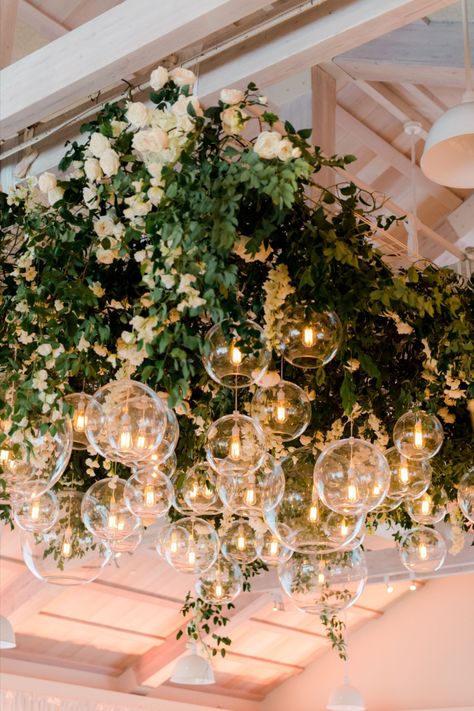 Greenery Ceiling Installation, Wedding Ceiling Decorations Flowers, Indoor Garden Party Wedding, Garden Party Indoor, Flowers Hanging From Ceiling Wedding, Wedding Lighting Indoor Receptions, Ceiling Flowers Wedding, Ceiling Floral Installation, Wedding Ceiling Installation