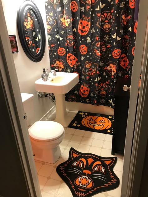 Cat rug and shower curtain from Sourpuss Clothing, bath mat from Khols, mirror upcycled and painted black Spooky Shower Curtain, Cute Goth Bathroom, Halloween Theme Bathroom, Goth Shower Curtain, Mirror With Curtains, Halloween Bathroom Decor Ideas, Halloween Restroom Decor, Halloween Decorations Bathroom, Halloween Bathroom Ideas