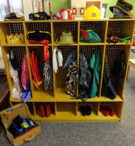 Cubbies/mailboxes turned into a Dress-up area for our preschools Dramatic Play center Play Area Ideas, Preschool Cubbies, Waldorf Playroom, Dress Up Corner, Head Start Classroom, Dress Up Area, Preschool Organization, Learning Centers Preschool, Dramatic Play Center