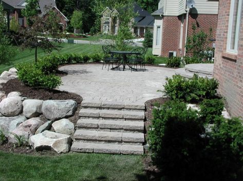 Front Entry Landscaping, Retaining Wall Patio, Boulder Retaining Wall, Xeriscape Front Yard, Patio Stairs, Brick Paver Patio, Landscape Pavers, Patio Installation, Brick Patterns Patio