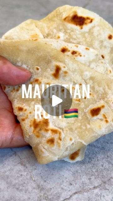 Shelina Permalloo on Instagram: "Mama Shila’s Mauritian Roti Recipe 🇲🇺 In my opinion nothing says I love you more than freshly cooked bread! I hope you enjoy, very simple but follow her steps for the perfect roti!  A few tips to remember  • when you add the oil to the flour mix it around so you almost make a shortbread, rub it into the oil with the salt until combined • add the water slowly and mix it thoroughly until the bowl is clean and rest for 30 mins  • roll out and then fold into layers and allow to rest for min of 15 minutes.  • keep moving the roti on the hot pan and brushing a bit of oil over it, don’t over cook this as it will keep the roti soft and fluffy  • finally when you remove from the heat place it into a tea towel to retain the softness   300g plain white flour  150-17 Simple Roti Recipe, Soft Roti Recipe, Making Roti, Pizza Muffins, Roti Recipe, Cheez It, White Flour, Pizza Bread, Plain Flour