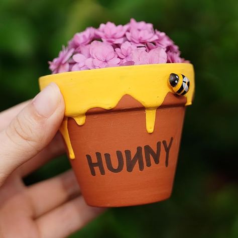 Amazon.com: Spelable 6 Pack Winnie Honey Pot, for Cupcake, Party Favor, Planter, Winnie Party Favor for Baby Shower 1st Birthday Party Decoration Hunny Pot : Toys & Games Pooh Crafts, Pooh 1st Birthday Party, Winnie The Pooh 1st Birthday, Bee Hive Craft, Baby Shower Decor Ideas, Hunny Pot, Shower Decor Ideas, Winnie The Pooh Honey, Anna Birthday