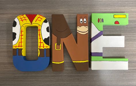 Toy Story Painted Letters, Toy Story Theme 1st Birthday, Toy Story Letters Diy, Toy Story Name Letters, 1st Birthday Toy Story Theme, Toy Story Letters Alphabet, First Birthday Toy Story Theme, Toy Story 1st Birthday Party Ideas, Toy Story Birthday Invitations