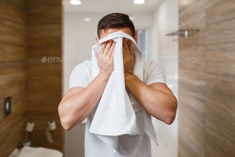 Man wipes his face with a towel, morning hygiene by NomadSoul1. Man wipes his face with a towel, front view, routine morning hygiene. Male person at the sink performs skin and body ... #AD #hygiene, #morning, #front, #wipes Information Technology Logo, People Poses, Art Animals, Normal People, Face Towel, Personal Hygiene, Envato Elements, Body Treatments, Happy Women