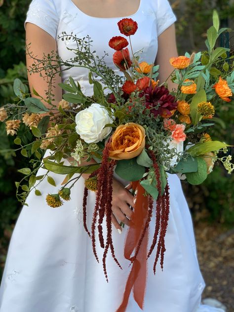 Wedding Flowers, Bridal Bouquet, Corsages, Boutonnieres, Arch Spray, Hair Accessories, Event Florals, Cake Flowers, Ceremony Floral Arrangements  Handmade to order. This arrangement incorporates rich fall colors with varying textures and several different greens to give it a natural and wild feel.  This bouquet is 24 inches wide from side to side so it is a large Bridal size.   We can make coordinating arrangements for your whole bridal party. Bridal Bouquet: About 18-24 inches wide Bridal Bouquets: About 20-24 inches wide  Bridesmaids Bouquets: About 10-12 inches wide Flower Girl Posey: About 5 inches wide Men's Boutonnieres: About 5 inches tall Wrist Corsages: About 5 inches Hair Comb: About 8 inches wide Cake Toppers/Sprays: About 6 inches wide Floral Head Crown: Inner diameter about 6 Fern Wedding Bouquet Fall, Bridesmaid Fall Bouquet, Fall Wildflower Bouquet, Ceremony Floral Arrangements, Eucalyptus Wedding Flowers, Elopement Florals, Red Bridal Bouquet, Fern Wedding, Event Florals