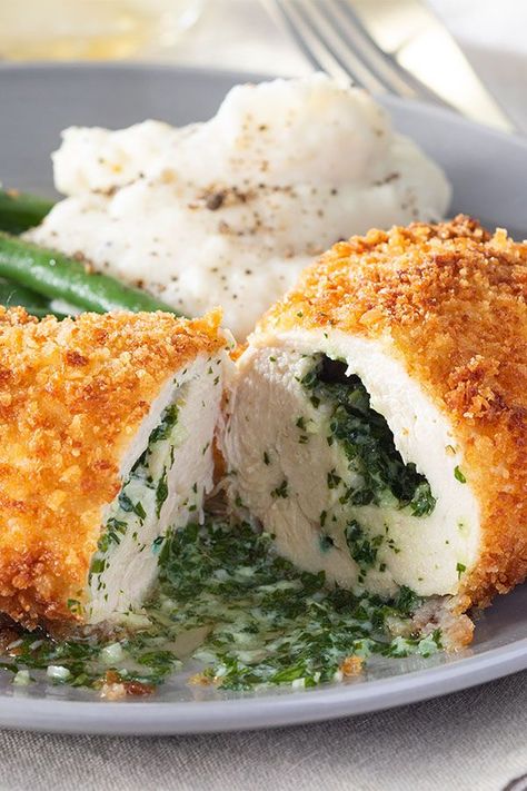 Looking for dinner ideas? Try cooking this chicken kiev. Use chicken breasts, parsley, and bread crumbs to cook this baked chicken recipe for a quick and easy dinner recipe. Chicken Kiev Recipe, Chicken Breast Dishes, Chicken Kiev, Chef John, Chicken Breast Seasoning, Diet Vegetarian, Breaded Chicken, Yum Yum Chicken, Garlic Butter