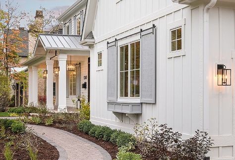 White Vertical Siding, White Shutters, Farmhouse Exterior Design, Vertical Siding, Stone Exterior, Home Bunch, Primitive Homes, Shutters Exterior, Modern Farmhouse Exterior